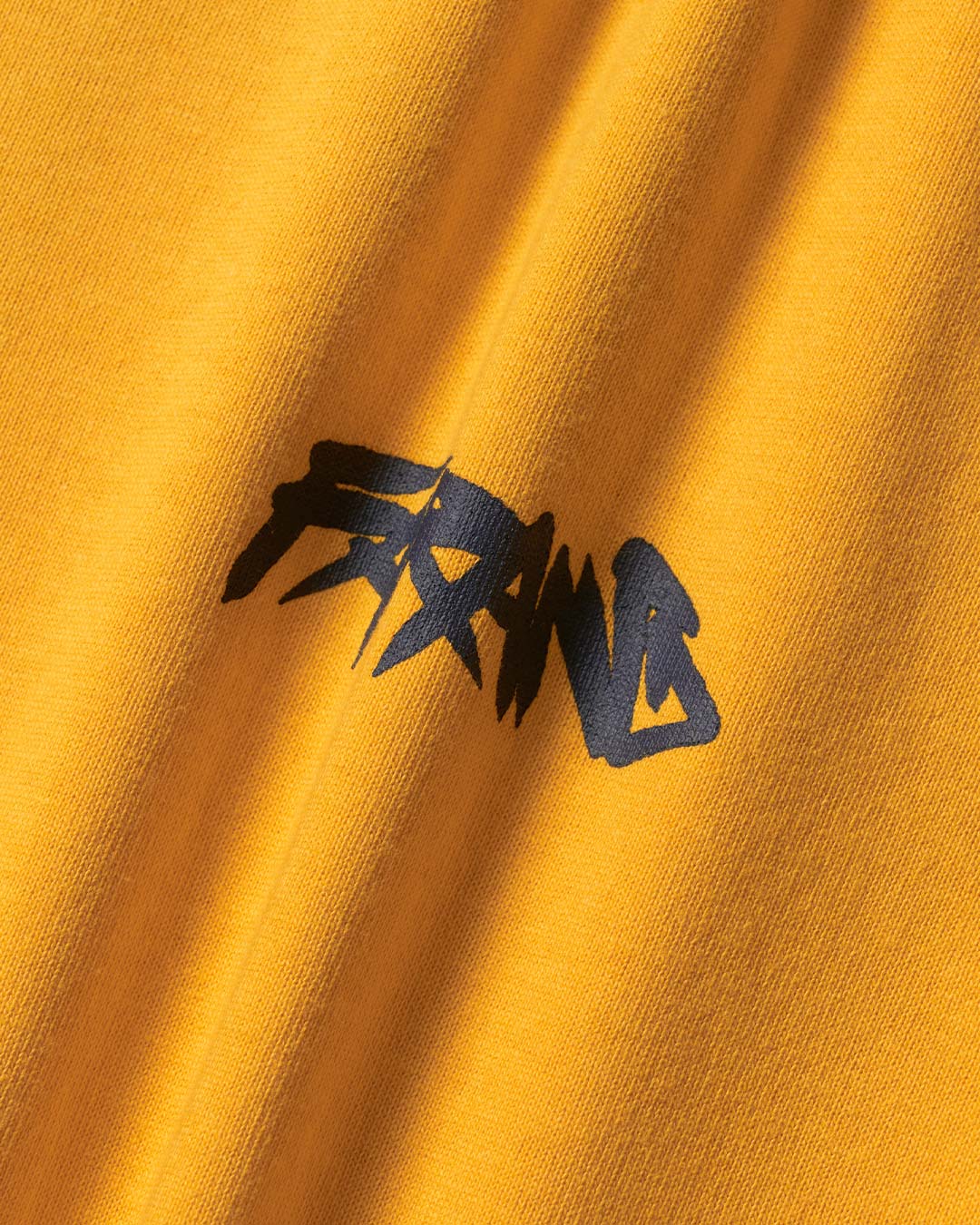 BRUSH TEE